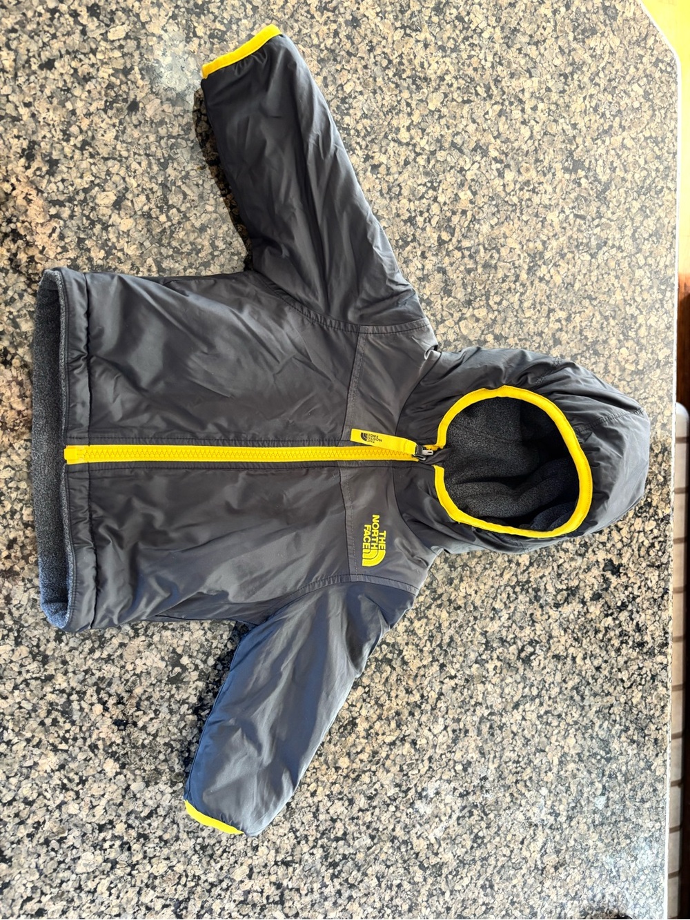 The North Face Kids Hooded Jacket in Charcoal with Yellow Accents